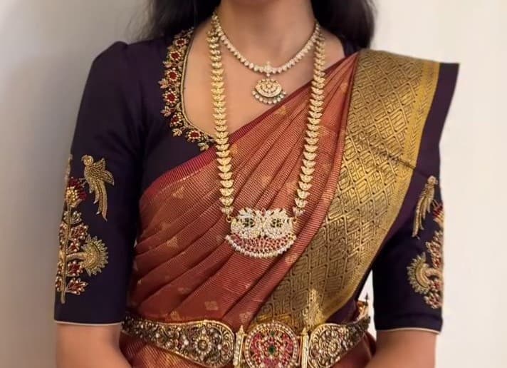 A close-up of a beautifully tailored blouse.